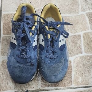 Saucony Blue and Yellow Sneakers  Small stains of ink on both tennis in front